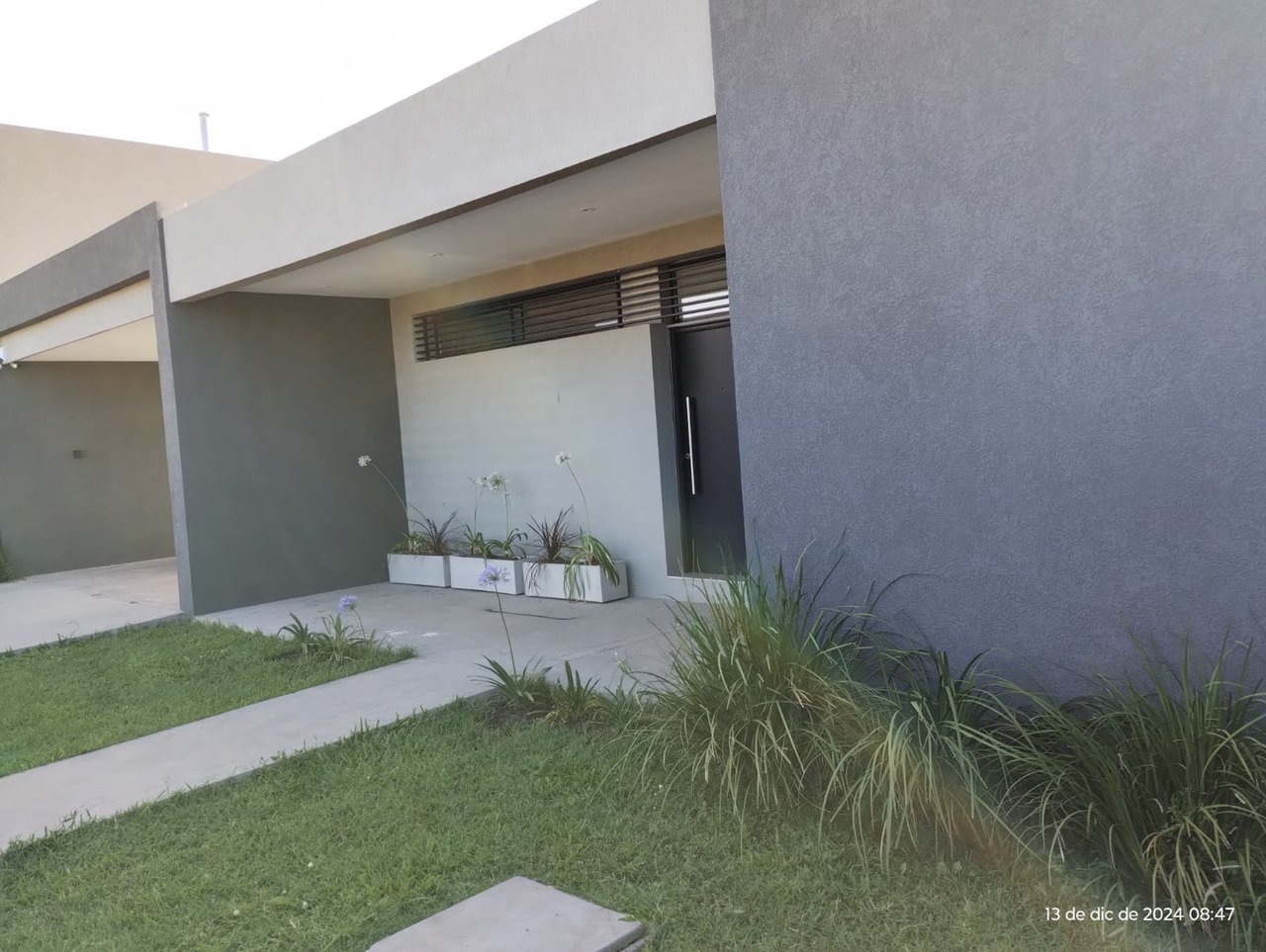Ingreso · Revestimiento y parque, trabajo de GM Construcciones