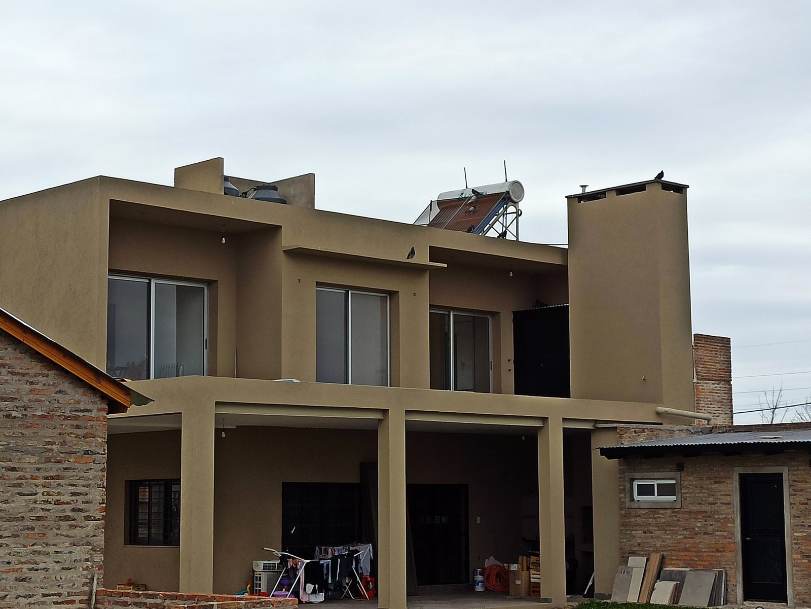 Vivienda de dos plantas terminada por GM Construcciones